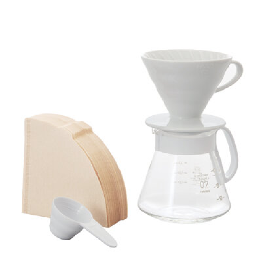 Kit V60 Pale Grey incluye dripper, range server v60 clear de vidrio, medidor de café y filtros de papel.